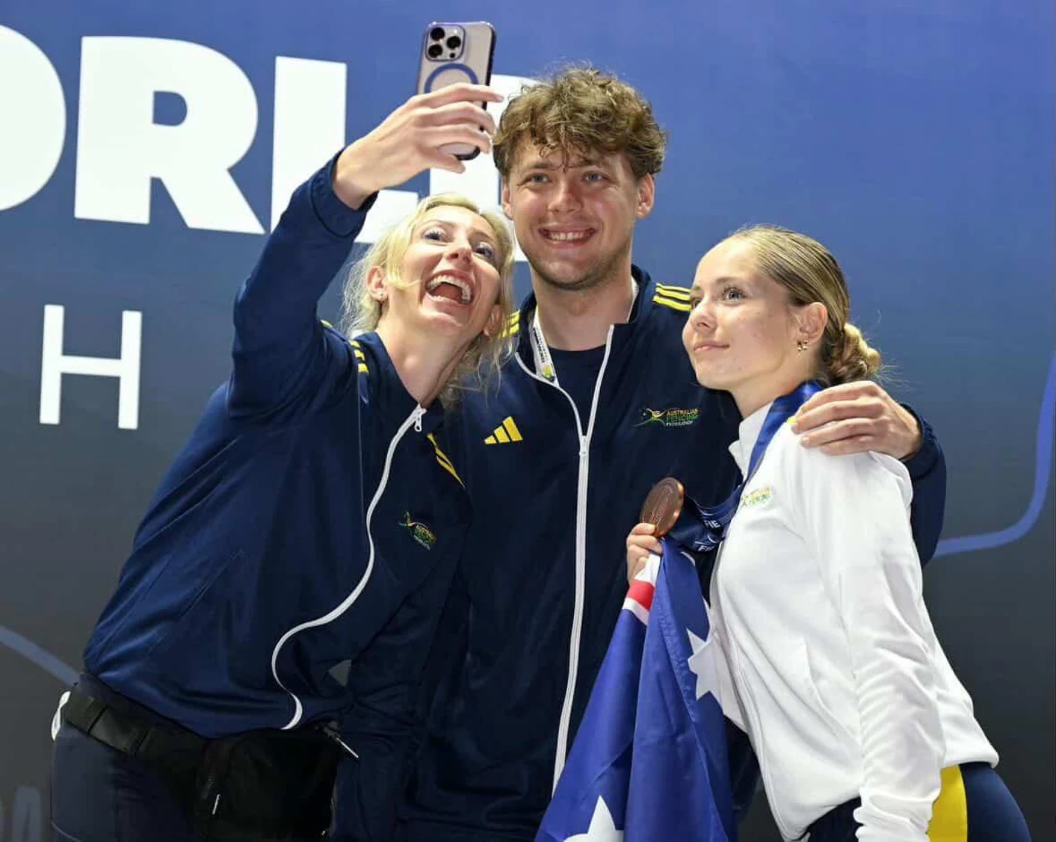 Zara sharing a celebration with teammates and supporters